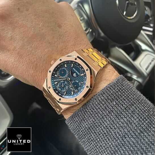 Audemars Piguet Royal Oak Chronograph 26240OR.OO.1320OR.01 Audemars Piguet Royal Oak Blue Dial Gold Case Replica on the man wrist in car