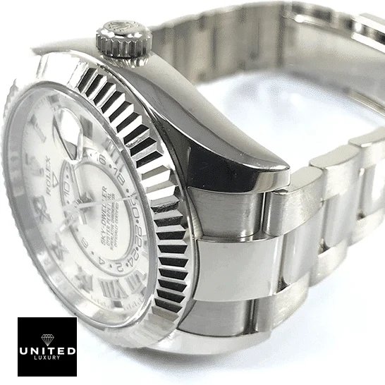 Rolex Sky-Dweller 326939 Rolex Sky-Dweller White Dial 326939 Fluted Bezel Oyster Replica on the table