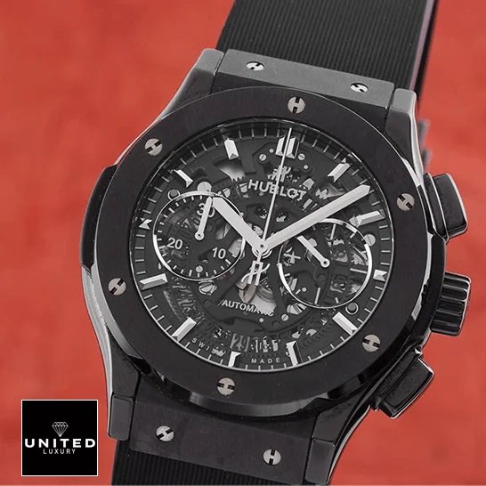 Hublot Big Bang Unico Hublot Big Bang Black Dial Steel Case Replica crown / push button red background