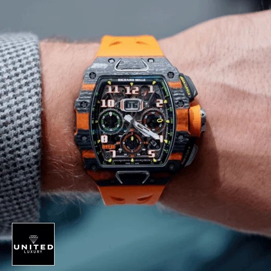 Richard Mille RM 11-03 Richard Mille Mclaren hand Orange Rubber Bracelet Replica on the man wrist