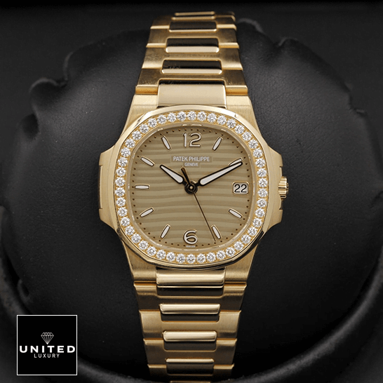 Patek Philippe Nautilus 7010/1R Patek Philippe Nautilus 70101R-012 Diamond Bezel Gold Bracelet Replica black background
