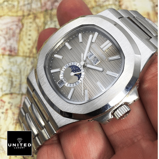 Patek Philippe Nautilus Patek Philippe Natilus Grey Dial Moon Steel Replica on the hand map background