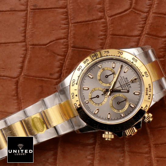 Rolex Cosmograph Daytona 116503 Rolex Daytona Cosmograph 116503 Stainless Steel & Yellow Gold Oyster Replica on the table