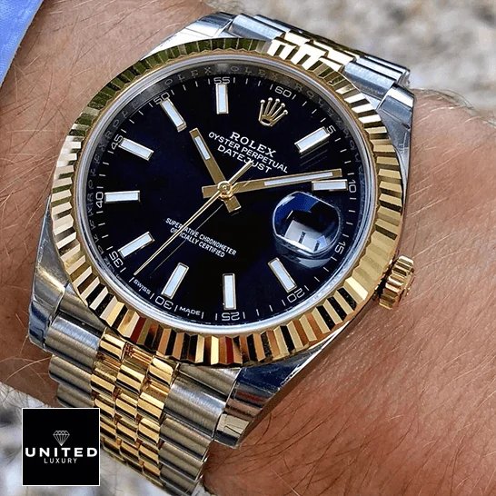Rolex Datejust 126333 Black Jubilee Premium Replica 1:1 Rolex Datejust 126333 Black Dial Yellow Gold Replica on the man wrist