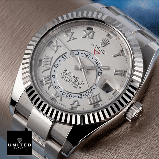 Rolex Sky-Dweller 326939 Rolex Sky-Dweller White Dial 326939 Oyster Replica on the table