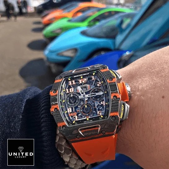 Richard Mille RM 11-03 Richard Mille Mclaren hand Orange Rubber Bracelet cars background