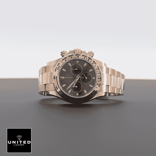 Rolex Cosmograph Daytona 116505 Rolex Daytona Cosmograph 116505-0013 S.Steel Oyster Replica on the table