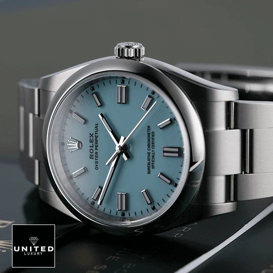 Rolex Datejust 126000 Oyster Perpetual Rolex Perpetual 126000 Turquoise Dial Oyster Replica on the table