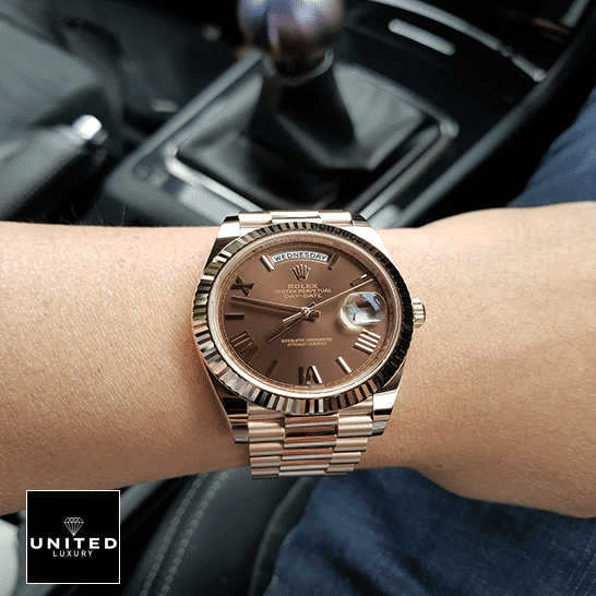 Rolex Day-Date 118139 Rolex Day-Date 40 228235-0002 Brown Dial with diamonds Replica on his arm