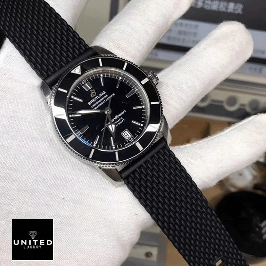 Breitling 128348RBR-0030 Breitling Superocean Automatic Black Bezel Replica on the white glove hand