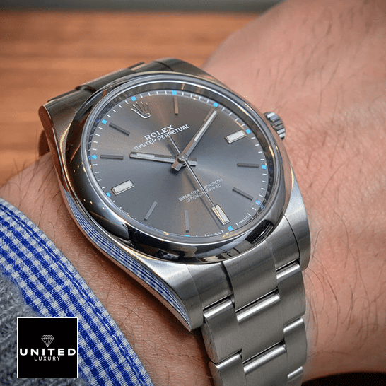 Rolex Datejust 114300 Oyster Perpetual Rolex Datejust Perpetual 114300 dial is a dark rhodium grey Replica on his arm