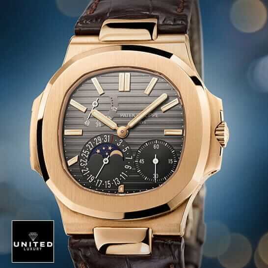 Patek Philippe Nautilus 5712R-001 Patek Philippe Nautilus Black Dial Leather Bracelet Replica blue background