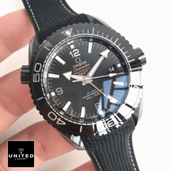 Omega Seamaster 215.92.46.22.01.001 Omega Seamaster Black Dial Bezel Replica on the hand white background