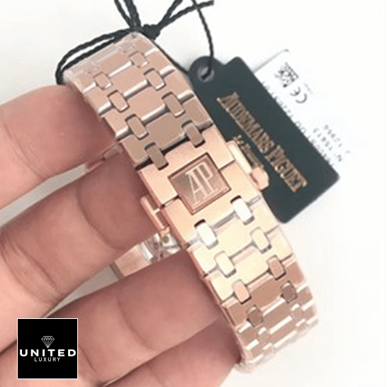 Audemars Piguet Royal Oak 15400OR.OO.1220OR.01 Perfect Clone Quality audemars piguet royal oak rose gold 15400OR.OO .1220OR.01 black dial man. left Audemars Piguet Rose Gold Stainless Steel Bracelet Replica next to label card