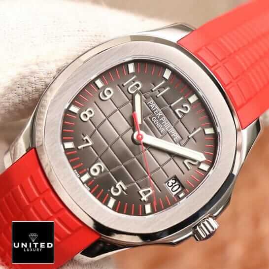 Patek Philippe Aquanaut 5167A Patek Philippe Geneve Brown Dial Red Rubber Bracelet Replica on the hand