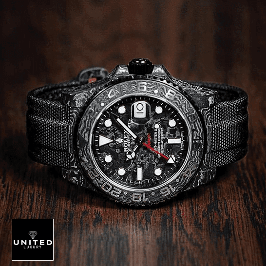 Rolex GMT Master 116610LV Rolex DiW NTPT Carbon Black Replica on the table