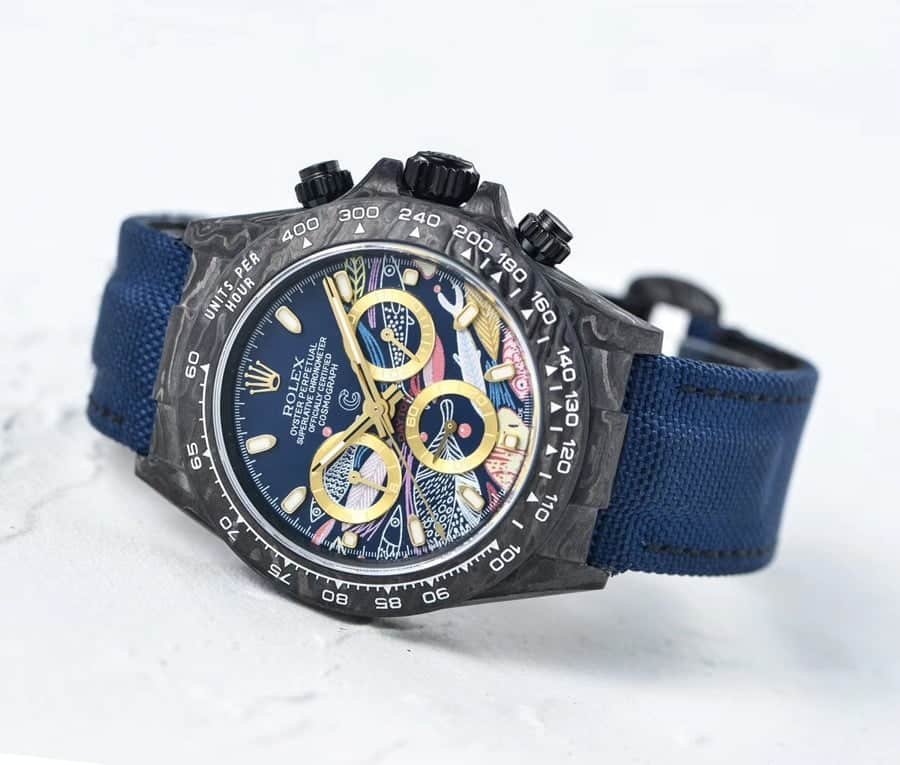 Rolex Cosmograph Daytona 2071401 Rolex Daytona Cosmograph Color Fish Pattern Dial 2071401 Replica on the table