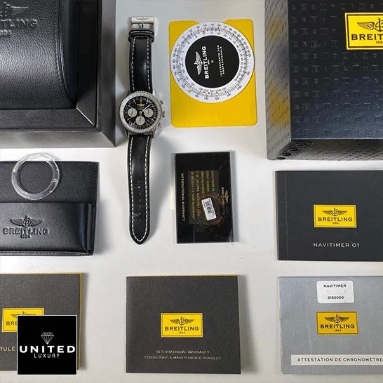Breitling Navitimer B01 Chronograph 46 AB0127211B1X1 Breitling Navitimer Black Dial Replica next to warranty card