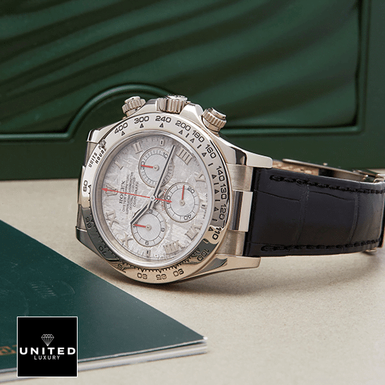 Rolex Daytona 116519 Rolex Daytona 116519 Meteorite Dial Romen Numerial Replica on the table